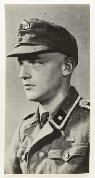 Portrait of a German SS. On his cap the symbol of the Totenkopf division.